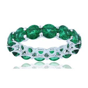 Green Cubic Zirconia Eternity Band in Rhodium Plated Sterling Silver